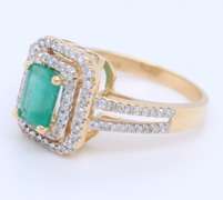 Attractive Emerald Cut Emerald in Double Halo Diamond Setting