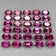 Ravishing 8.80ct violet pink Rhodolite Garnet set