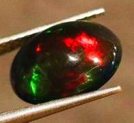 Gorgeous 1.72ct ribbon flashing Black Opal