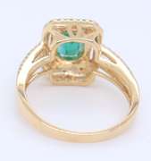 Attractive Emerald Cut Emerald in Double Halo Diamond Setting