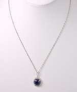Dazzling 9.16CTS Cabochon-Cut Star Sapphire and 0.05CTW Diamond Pendant Necklace in Sterling Silver