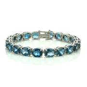 Sterling Silver 42ct London Blue Topaz 9x7mm Oval Tennis Bracelet