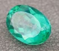 Attention grabbing 7.97ct emerald green Mystic Topaz