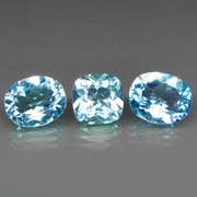 Large 11.91ct vivid blue mixed cut Topaz set