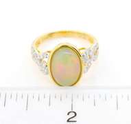 Opulent 2.44 CT Opal & .48 CTW Diamond Ring