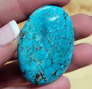 Striking well marbled 61.5ct Turquoise cabochon