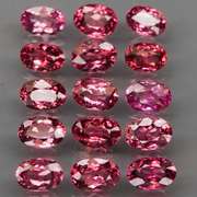 Remarkable 10.08ct violet pink Rhodolite Garnet set