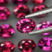 Amazing 4.41ct oval cut violet pink Rodolite Garnet set