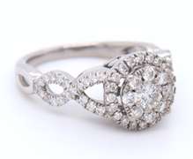 Impressive White Gold Diamond Halo Bridal Set