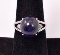 Captivating 9.27CTS Cabochon-Cut Star Sapphire & 0.11CTW Diamond Ring in Sterling Silver