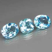 Large 11.91ct vivid blue mixed cut Topaz set