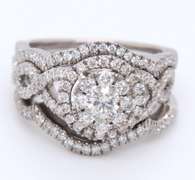 Impressive White Gold Diamond Halo Bridal Set