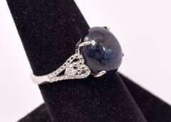 Spectacular 7.32CTS Cabochon-Cut Star Sapphire & 0.08CTW Diamond Ring in Sterling Silver