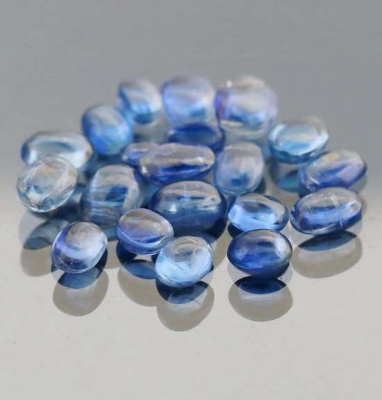 Excellent 11.44ct sapphire blue Kyanite cabochon set