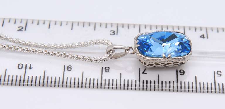 Sterling Silver Blue Topaz Pendant on Chain