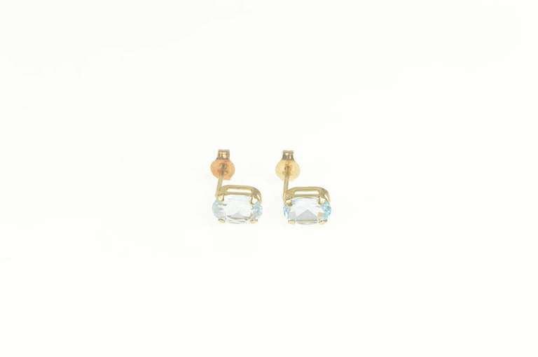10K Yellow Gold Oval Blue Topaz Classic Solitaire Stud Earrings