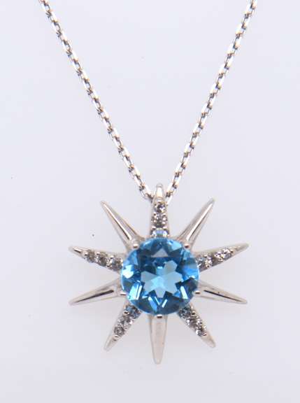 925 Sterling Silver Light Blue Cubic Zirconia Sun Pendant on Chain Necklace