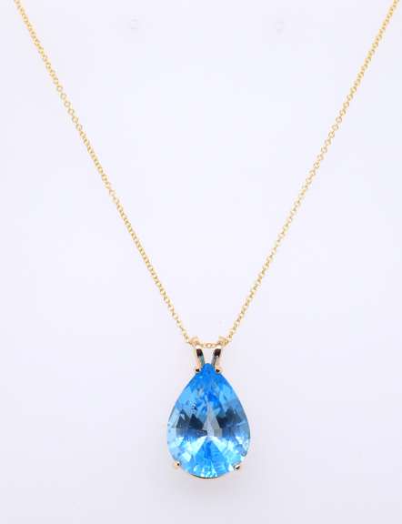 Gorgeous Yellow Gold Pear Shaped Blue Topaz Pendant on Chain