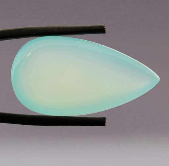 Glowing 27.53ct untreated pear Chalcedony cabochon