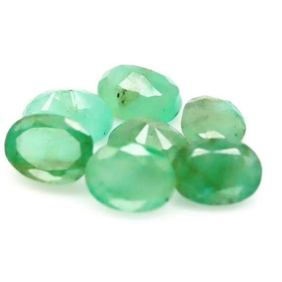 Oval cut 9.04ct Zambian Emerald set