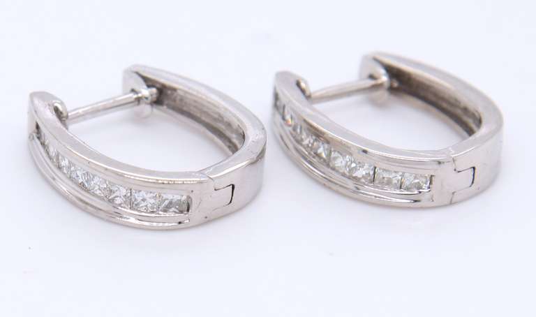 Dazzling White Gold Channel Set Princess Cut Diamond Earrings