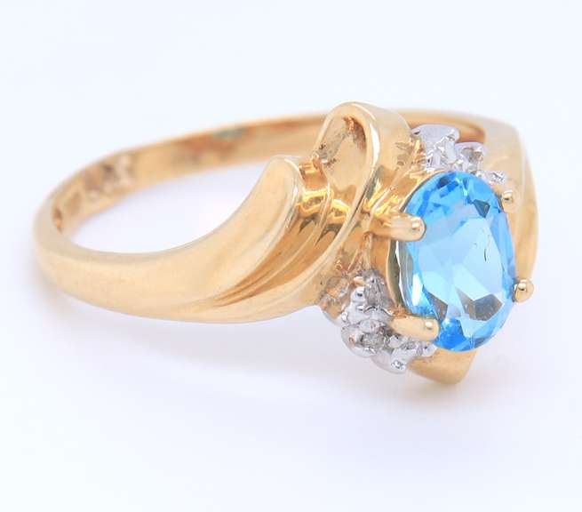 Fantastic Yellow Gold Blue Topaz and Diamond Ring