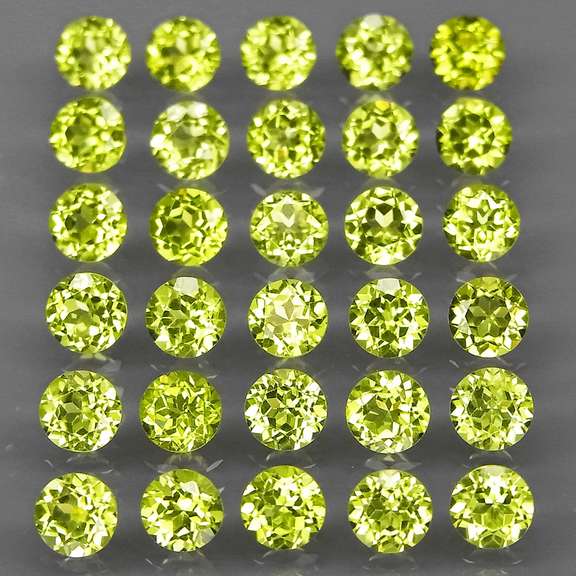High grade 9.05ct untreated apple green Peridot set