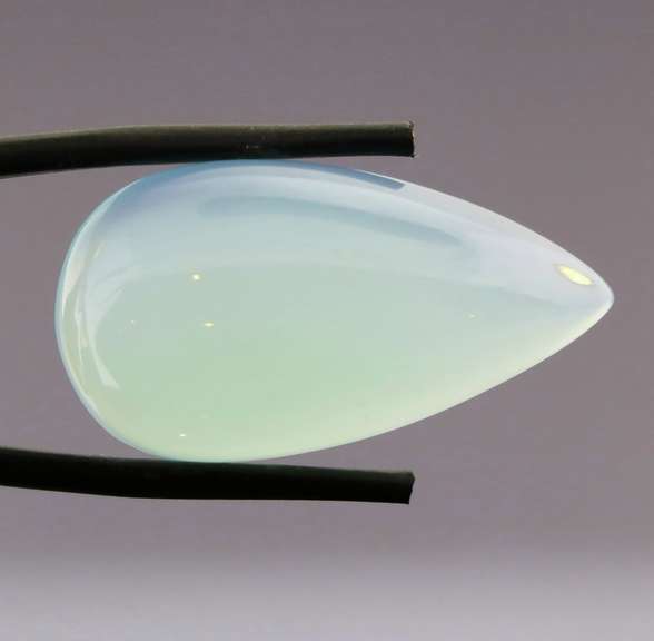 Glowing 27.53ct untreated pear Chalcedony cabochon