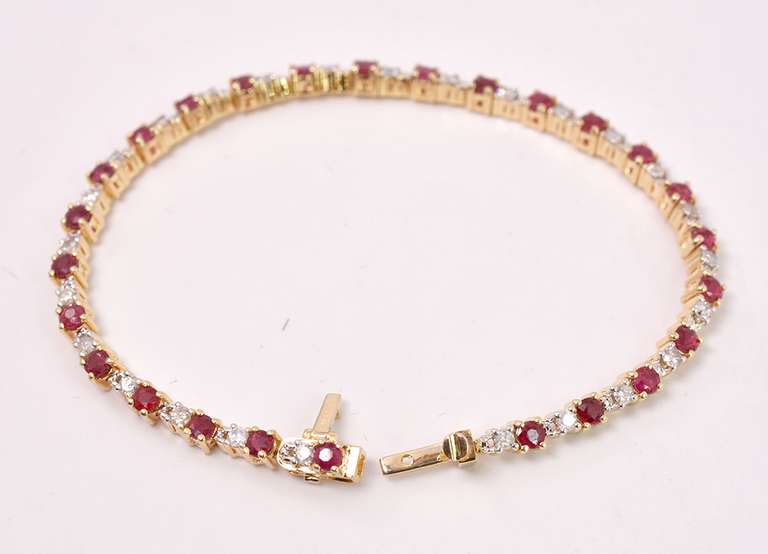 Adorable 4.00CTW Ruby & 1.10CTW Diamond Bracelet in Gold Plated Sterling Silver