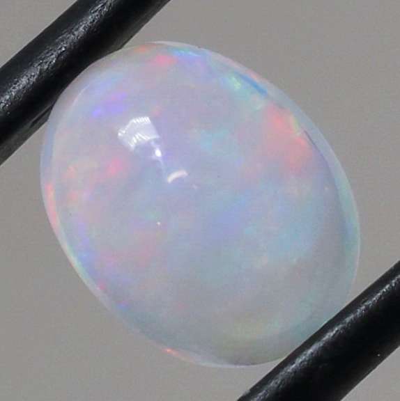 Glowing! 1.72ct smoldering floral pattern Jelly Opal