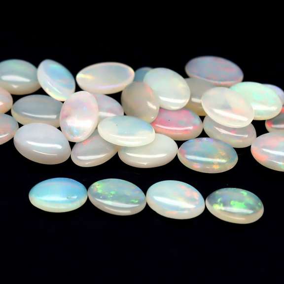 Beautiful 7.30ct unheated Ethiopian opal set