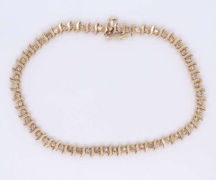 Gorgeous Yellow Gold Diamond S Tennis Bracelet