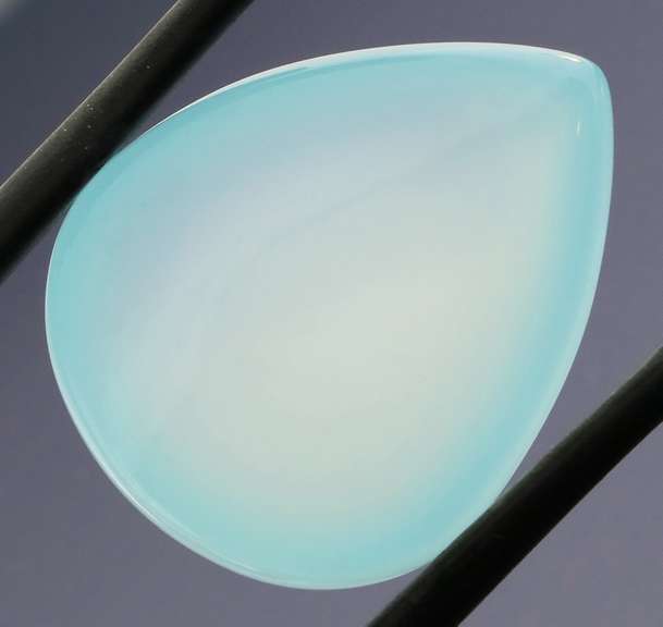 Glowing 20.13ct untreated pear Chalcedony cabochon