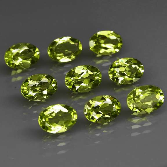 Dazzling 7.33ct untreated apple green Peridot set