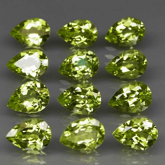 Dazzling 8.66ct untreated apple green Peridot set