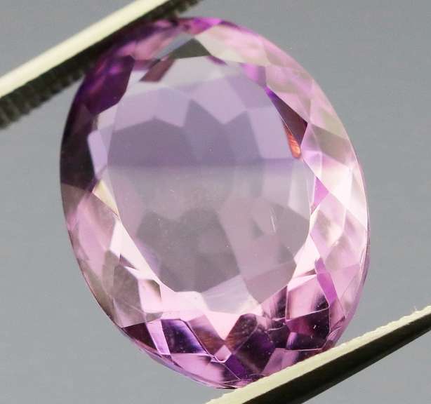 Glittering oval cut 8.35ct violet Amethyst
