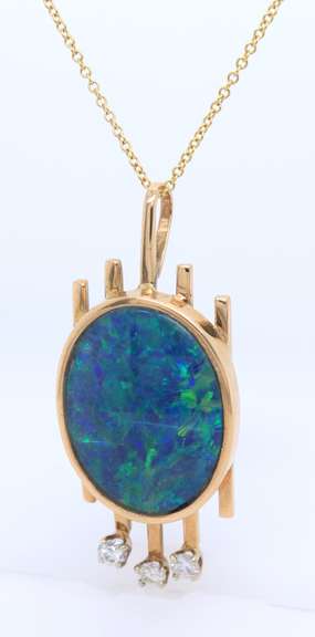 Graceful Yellow Gold oval Cabochon and Diamod Pendant on Chain