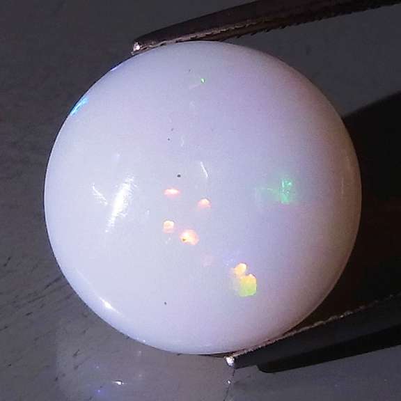 Magnificent 9.37ct disco flashing Welo Opal