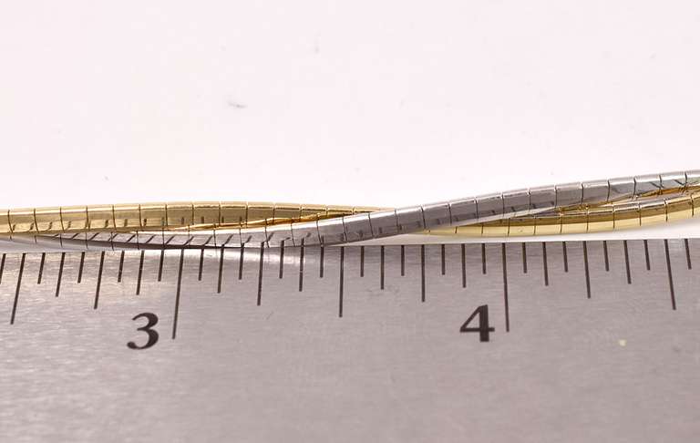 Mesmerizing Omega Link Bracelet in Two Tone Gold