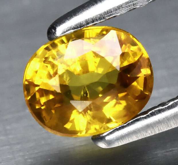 Simply amazing .59ct golden orange Sapphire