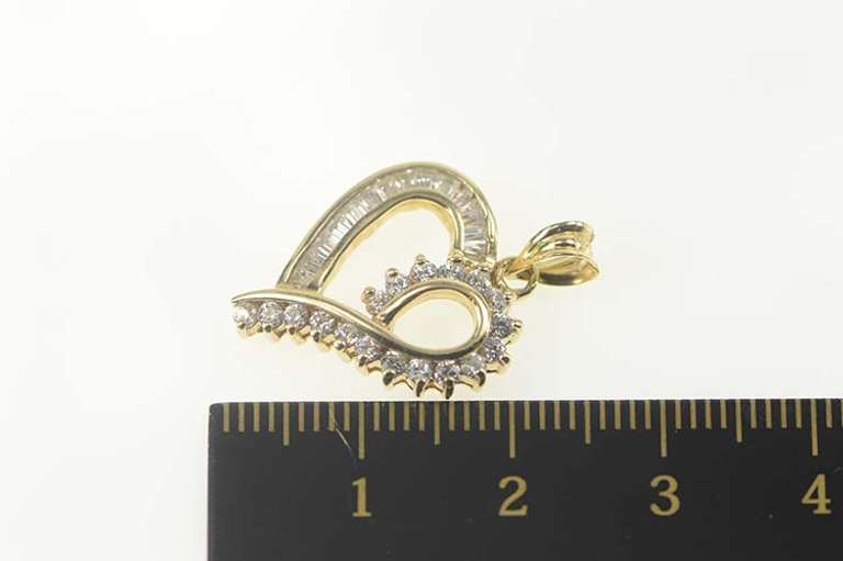 10K Yellow Gold 0.70 Ctw Round & Baguette Diamond Heart Pendant