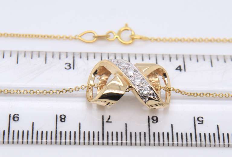 Attractive Yellow gold Diamond X Slider Pendant on Chain