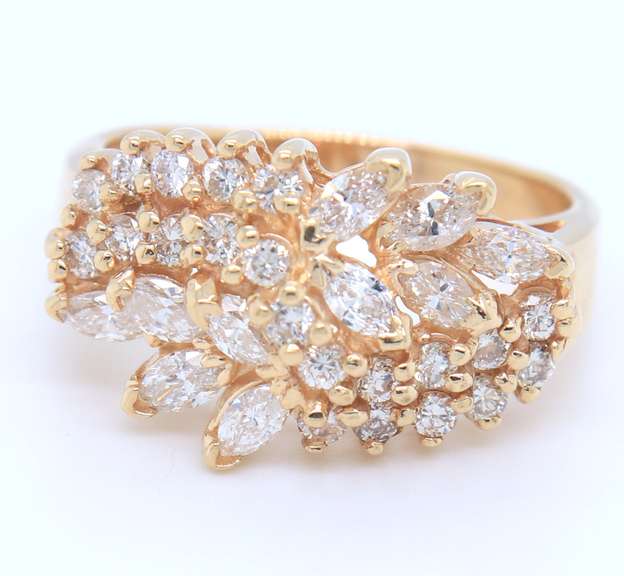 Handsome Marquoise and Round Cut Diamond Cluster Ring
