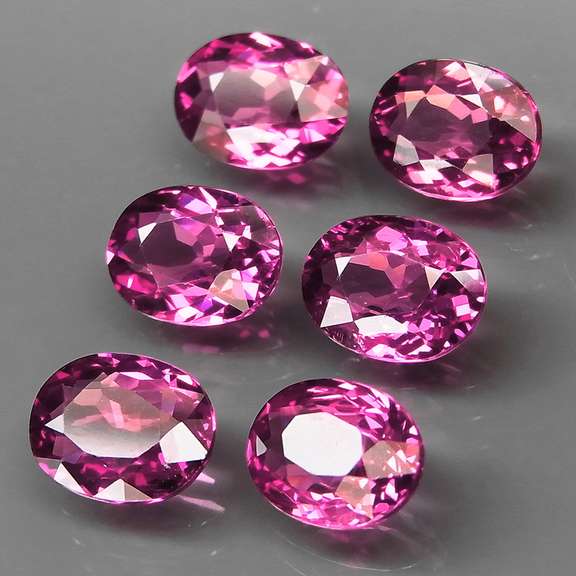 Remarkable 8.61ct violet pink Rhodolite Garnet set