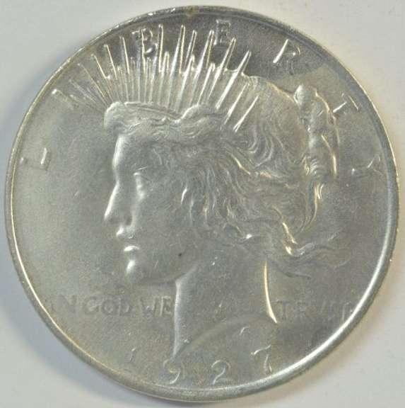 Mint State 1927-D Peace Silver Dollar. Key date, cleaned