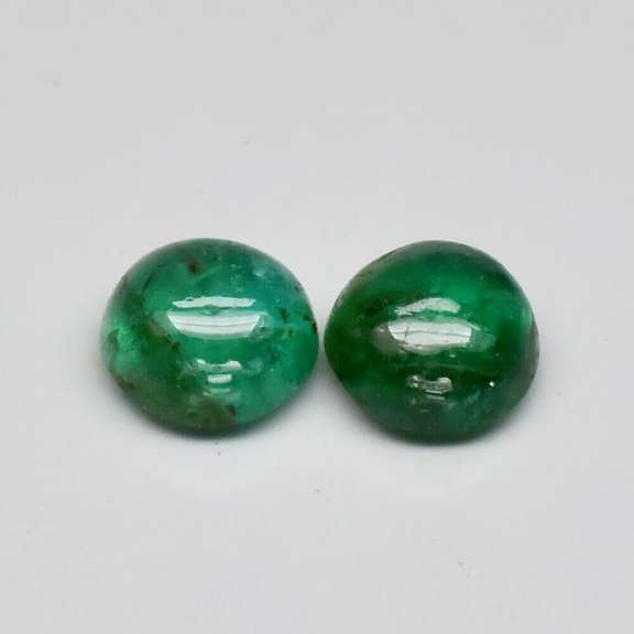 Gorgeous .65ct Zambian Emerald cabochon pair