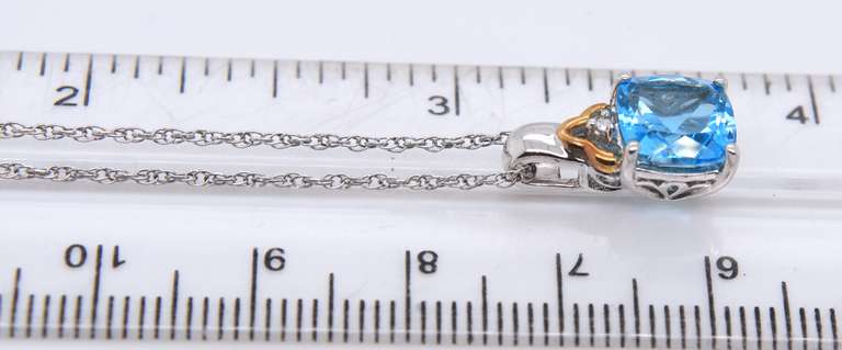 Sterling Silver and Gold Blue Topaz Pendant on Chain