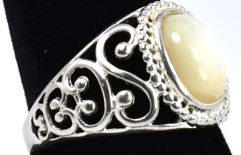 Sterling Silver Ring With An Iridescent Stone