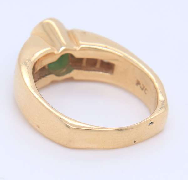 Incredible Yellow Gold oval Cut Emerald and Diamond Ring