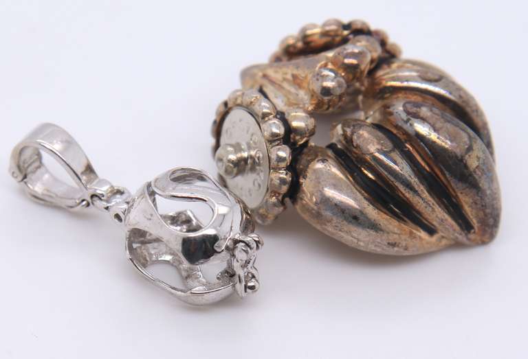 Lot of 2 Vintage Sterling Silver Pendants